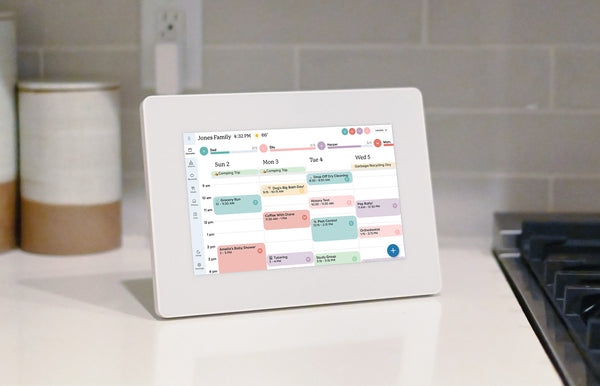 Front view of the Skylight Digital Calendar with a 10-inch touchscreen displaying a daily schedule.